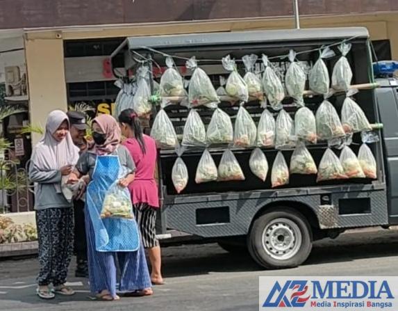 IMG 20230520 WA0019 Jum’at Berkah, Polsek Pagu Bagikan Sayur Gratis Kepada Warga